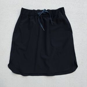 Lululemon Womens Size 8 On The Fly Skirt Solid Black Blue Drawstring Golf Casual